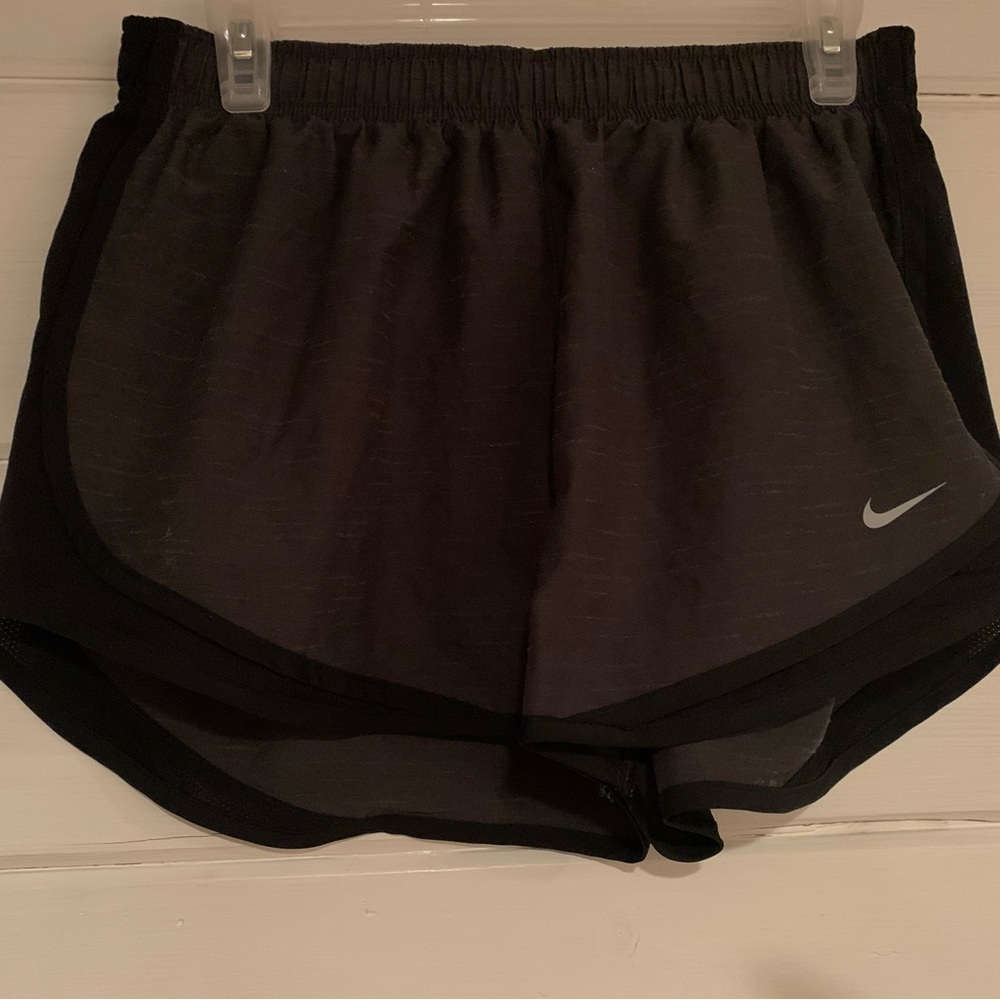 Black lined Nike shorts , new without tags